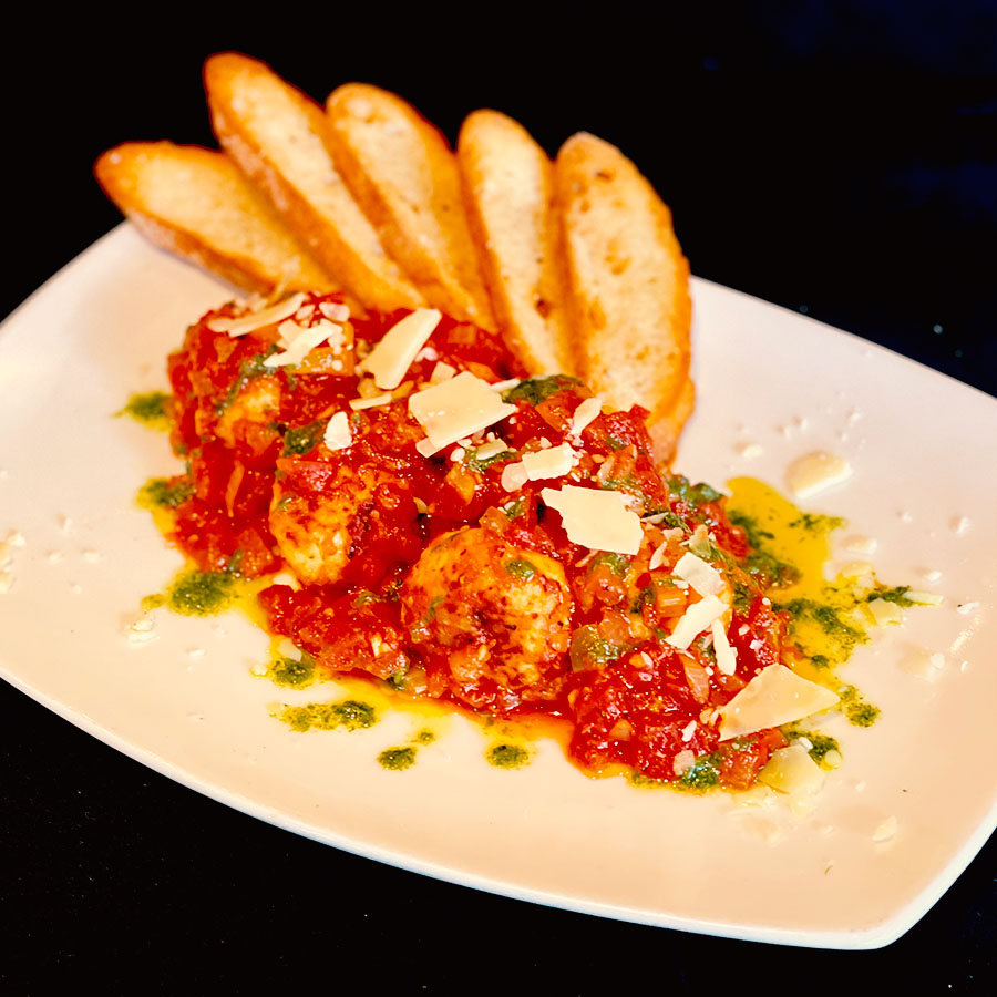 Chicken Ricotta Meatballs with toasted crostini and red sauce