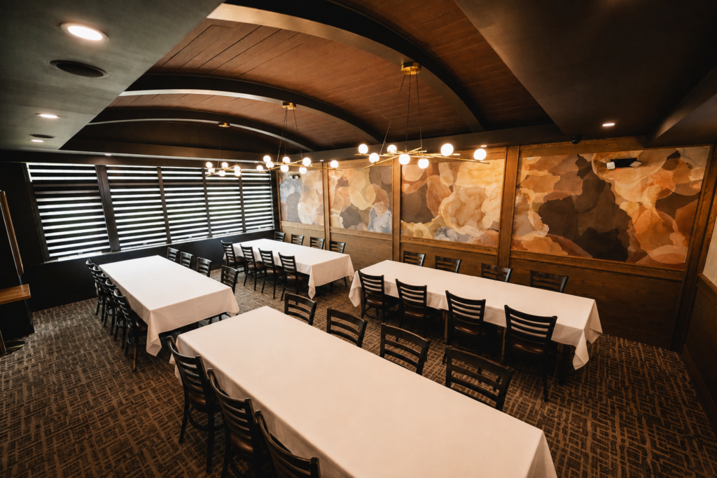 The private dining room at MTM Tavern Steakhouse, set for a group